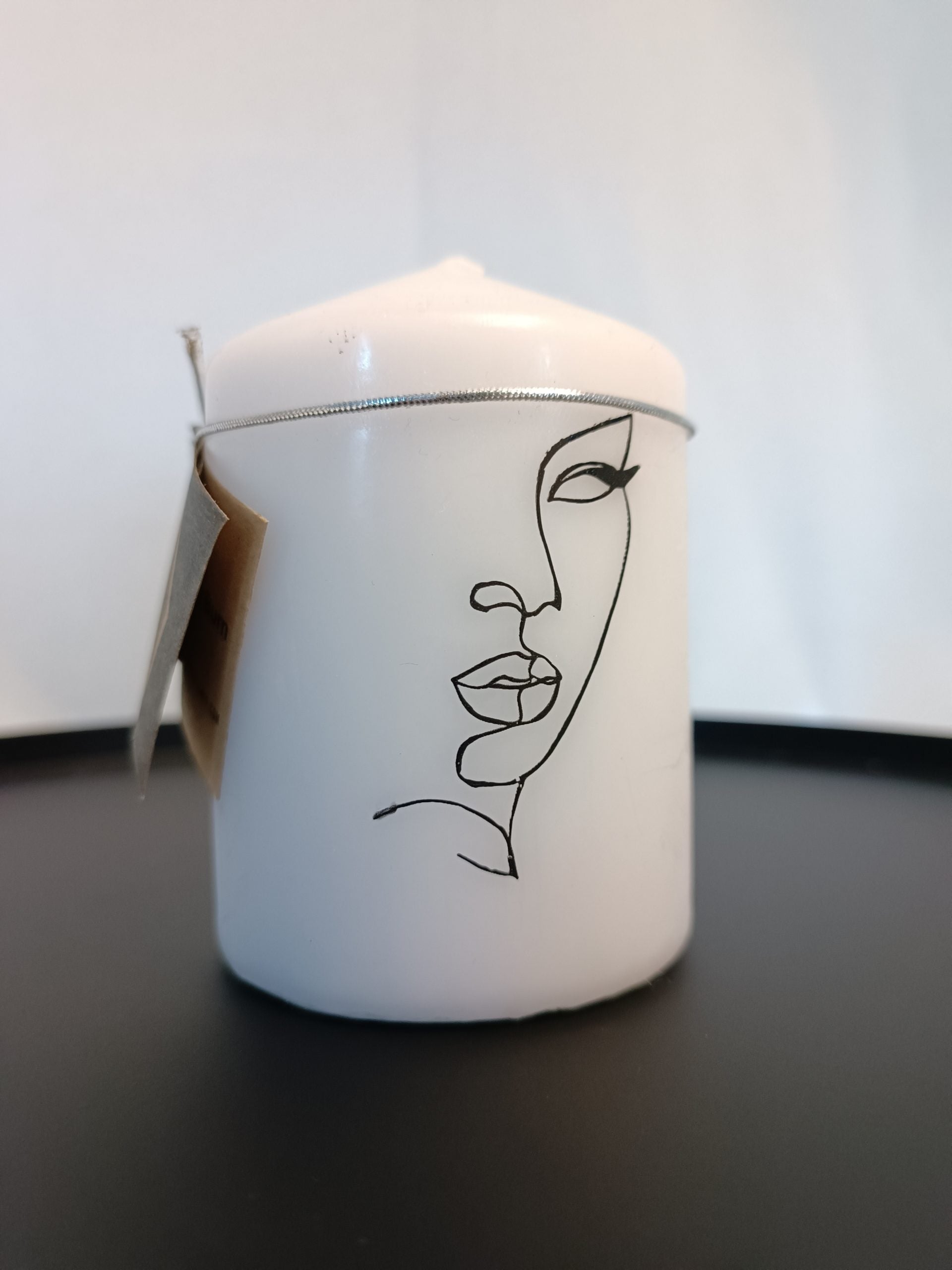 Stumpenkerze mit Punkten/ Oneline-Gesicht